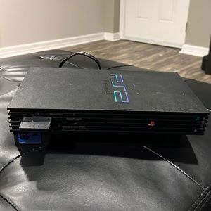 PlayStation 2 Console with Controller and Games